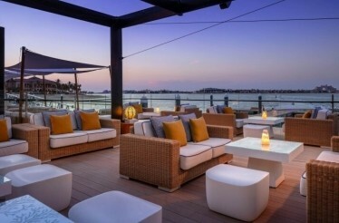 The stylish, lounge-like outdoor seating area at Restaurant 101.