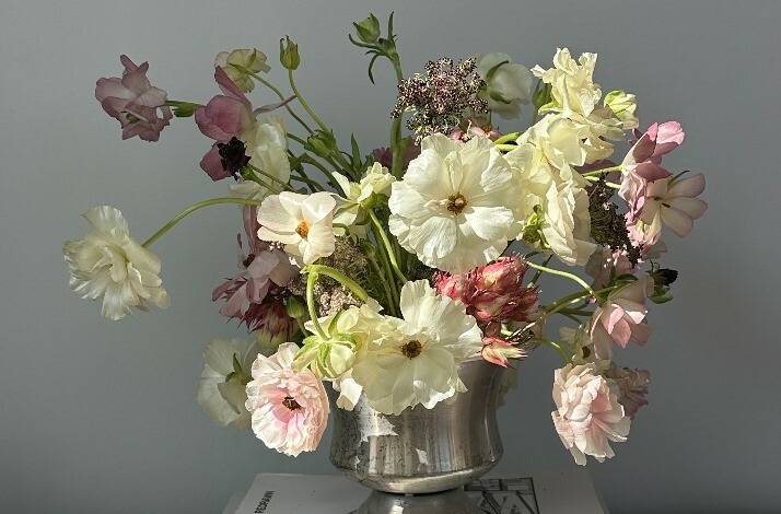 A beautiful arrangement of white flowers by Olivia McDowell.