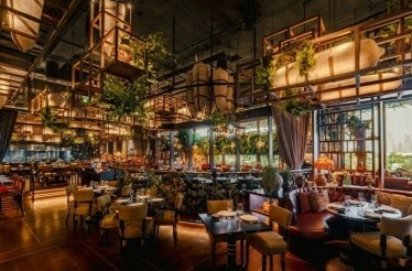 Modern Peruvian interior of the COYA Dubai restaurant.