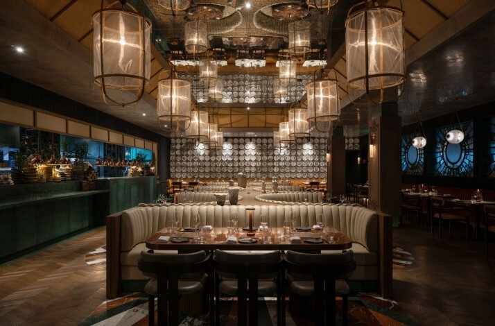 The stylish, art-driven space of Restaurant Clay Dubai, featuring dramatic lighting and an elegant design.
