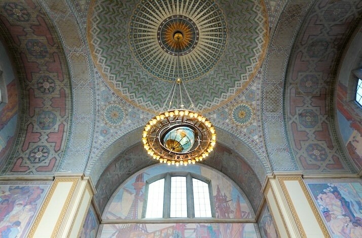 Ornate painted ceiling and chandelier, highlighting LA’s architectural heritage.