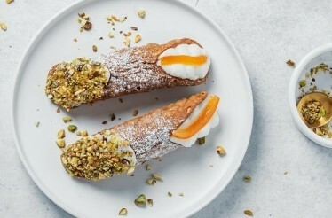 Promotional photo of cannolis made in an expert-led cannoli-making class at Eataly Flatiron's La Scuola.