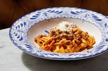 A photo of fresh tagliatelle bolognese