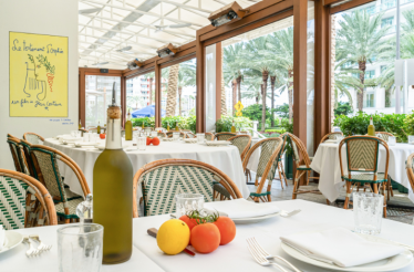 Dante restaurant in New York with tables set for dining outdoors.