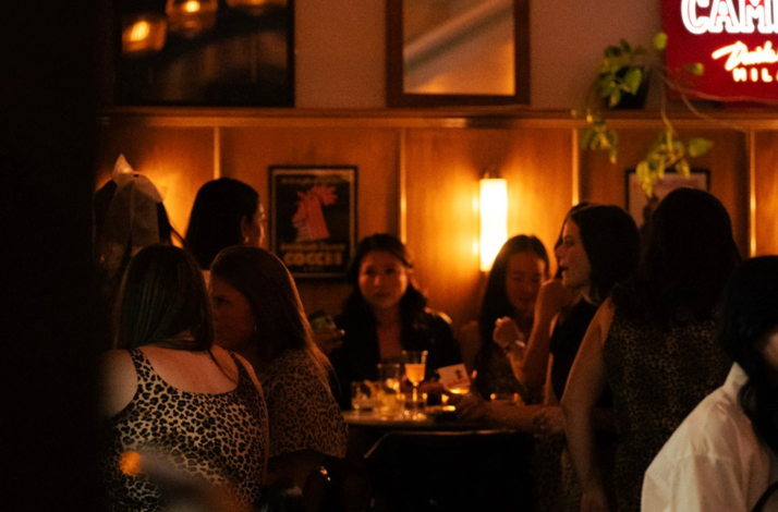 A group of people socialising in Bar Bello, Montréal's favorite aperitivo bar