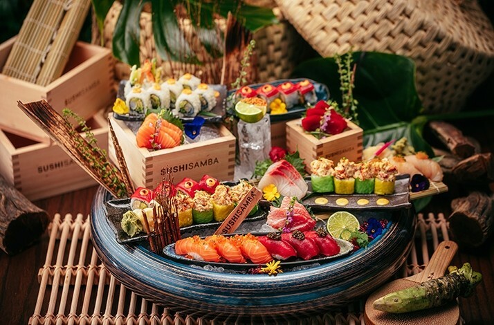 Assorted sushi and sashimi platter with vibrant garnishes at SUSHISAMBA Abu Dhabi.