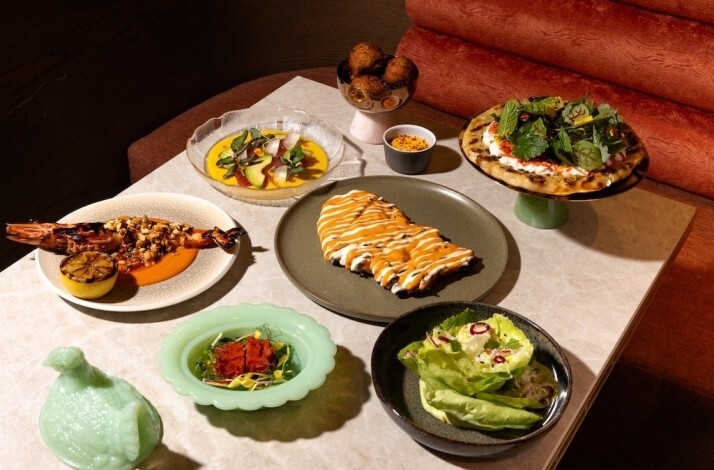 Caribbean-inspired multicourse dishes at immersive dining experience.