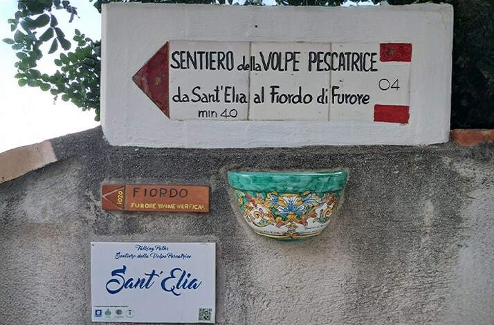  A sign mounted on a wall, displaying important information or directions for viewers.