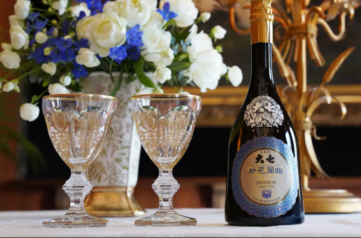 Daishichi sake bottle and tasting glasses for an exclusive sake pairing experience at Odo Lounge.