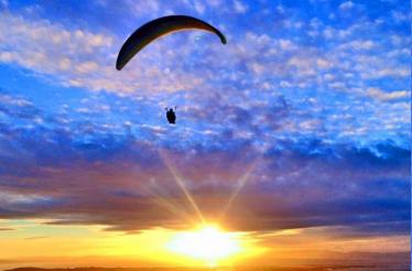 Soar Through the Air on a Tandem Paragliding Flight with an Expert Instructor: Daly City, California