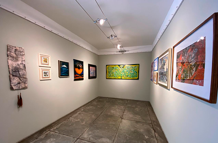 Paintings on display at Galería Oscar Román.