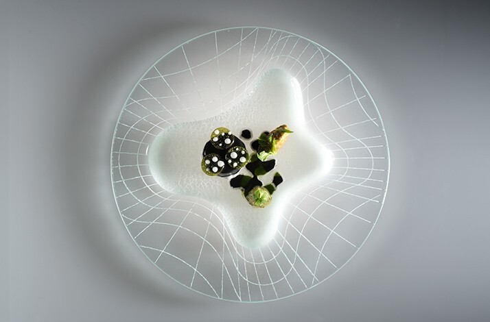 Fine dining dish served at three-Michelin-starred restaurant Enrico Bartolini al Mudec.