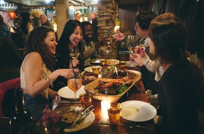 Diners enjoying a dinner at restaurant Peasant.