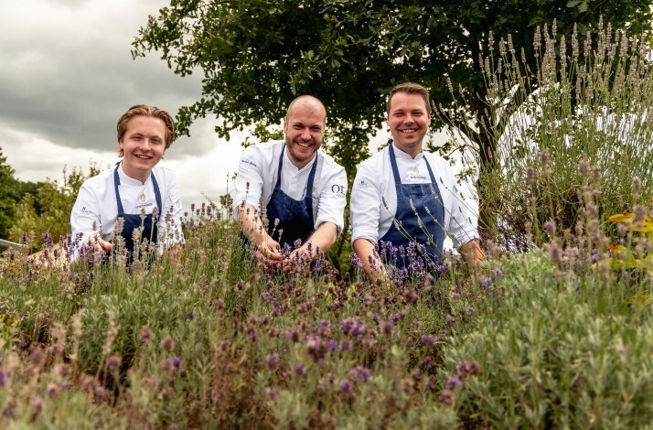 The chefs at Landhuishotel & Restaurant De Bloemenbeek photographed in the garden.
