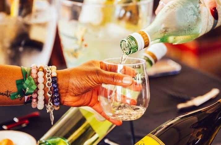 Close-up of a festive, vibrant wine-tasting pour.