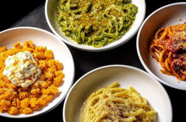 An assortment of coloured pasta dishes served at Luca Osteria.
