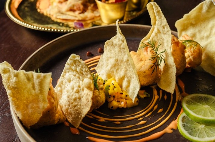 Starter course of spiced filling in poppadom shells with mango salsa and lime wedge, served at DAATA, Sandymount.