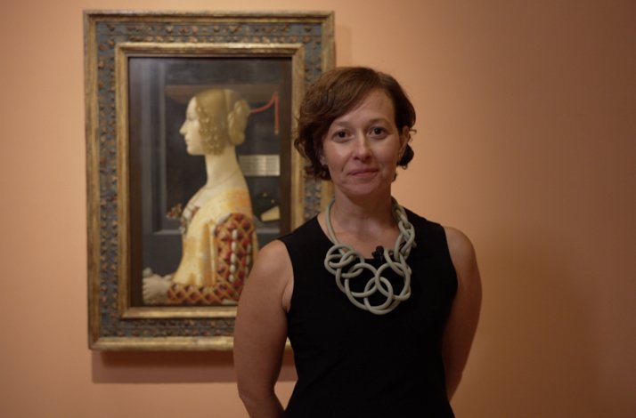 Rocío Rubio Álvarez stands in front of Portrait of Giovanna Tornabuoni, at Madrid's Thyssen-Bornemisza National Museum.