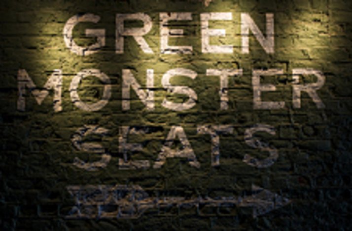  Green Monster seats at Fenway Park, offering a unique view of the baseball field and a vibrant atmosphere for fans.