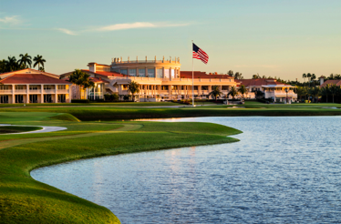 Landmark at Trump National Doral in Miami overlooking the river with US flag hovering over.