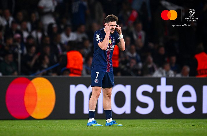 PSG player number 7 showing frustration on the pitch during UEFA Champions League semi-final first leg.