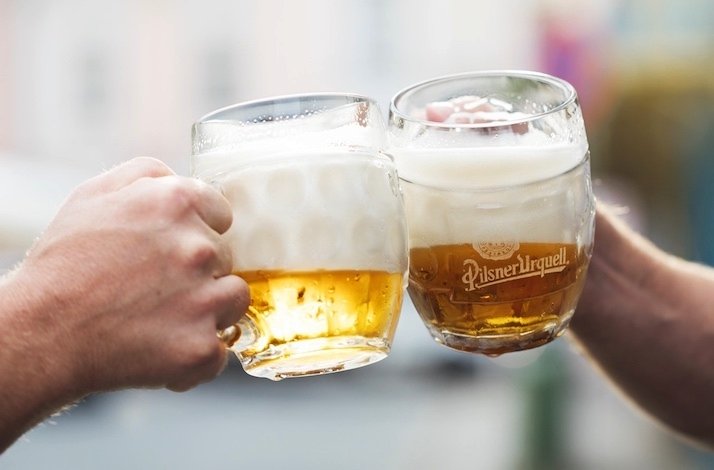 Two mugs of drinks for visitors of Old Town Prague.