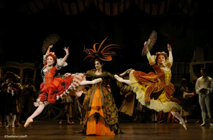 Ballet dancers perform during L Histoire de Manon on a theatrical stage.
