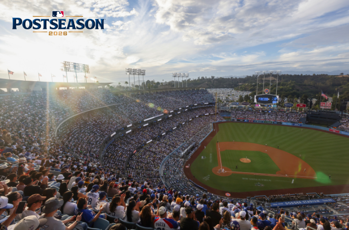 Dodger Stadium packed with fans during MLB Postseason 2026, with golden-hour sunlight over the outfield. Logo of MLB, upper-left.
