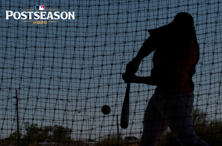 Silhouetted baseball player mid-swing in a batting cage at dusk. MLB Postseason 2026 logo in upper-left corner.