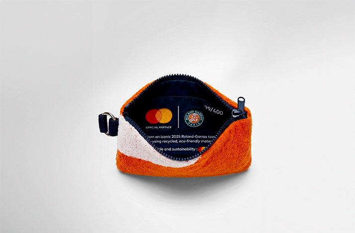 A pochette with Mastercard and Roland Garros logos printed inside.