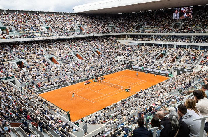 Tennis match in progress at Court Philippe-Chatrier.