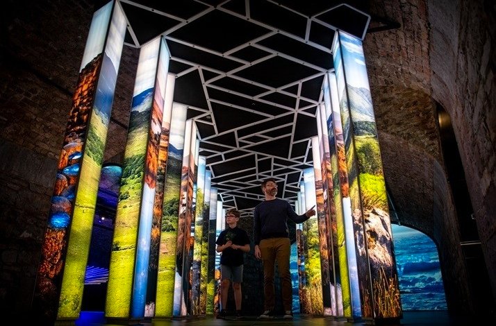 Father and son view the exhibits at EPIC The Irish Emigration Museum.
