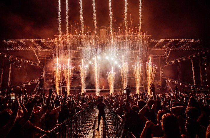 Large concert crowd with fireworks and bright stage lights at Ultra Europe in Split, Croatia.