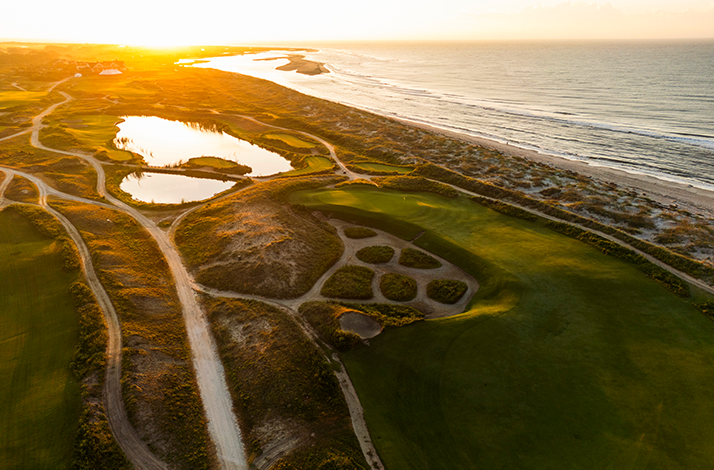 Beautiful aerial view of the Ocean Course at Kiawah Island Golf Resort in South Carolina at sunset.