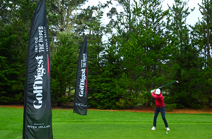 A person playing golf next to Golf Digest Inside the Ropes at Pebble Beach® banners.