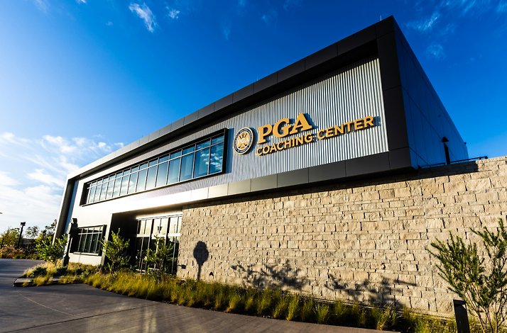 Exterior of the PGA Coaching Center, featuring bold signage and contemporary design.