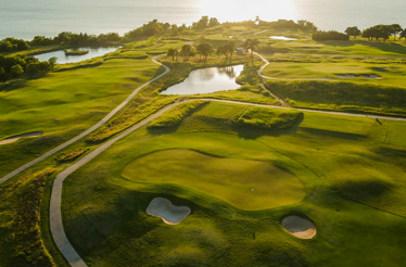 Bird’s-eye view of a golf field on a sunny day