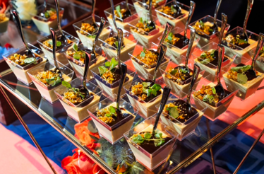 Elegant dessert cups with chocolate, nuts, and mint garnish, served at Chefs Tribute at Casa Cipriani.
