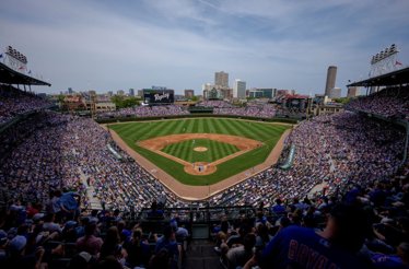Wrigley Field with full audience waiting for Chicago Cubs match start.