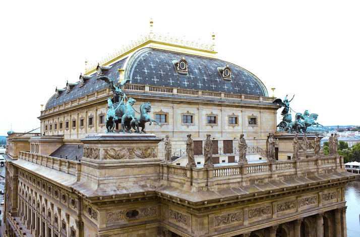 The roof's balustrade with statues of the Prague National Theatre.