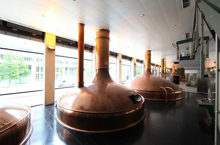 Polished copper brewing kettles lining the Spatenbrauerei brewery floor during the Oktoberfest Tour 2026.