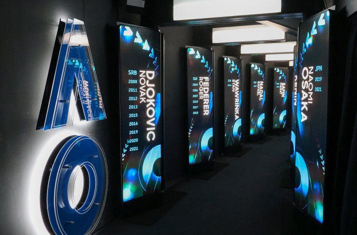 Hallway showcasing champion displays at Rod Laver Arena, Australian Open.