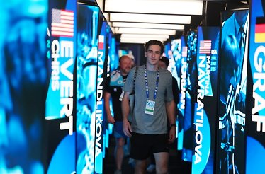 A guest walking at The Walk of Champions at the Australian Open