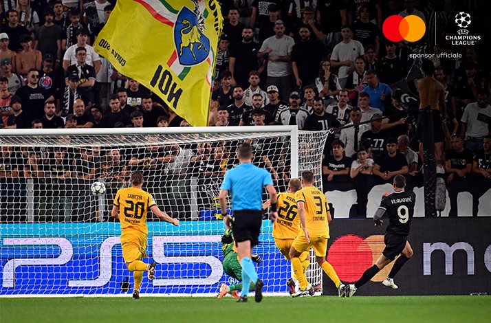 Juventus and Borussia Dortmund football players photographed during UEFA match.