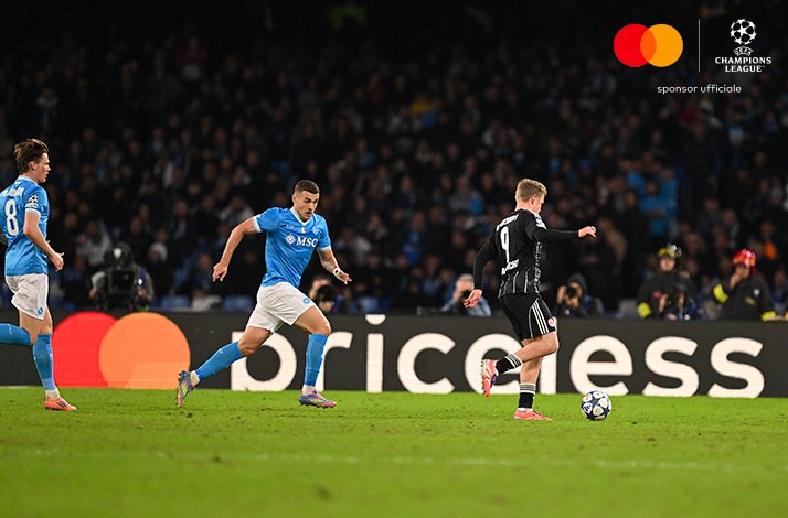 SSC Napoli and Eintracht Frankfurt football players photographed during UEFA match.