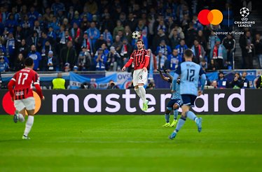 3 players on the field during UEFA Champions League match