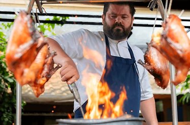 The chef preparing a meal