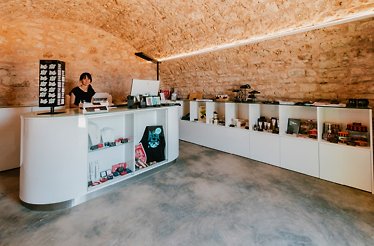 Inside one of the shops located at Šibenik fortress with many souvenirs on display.