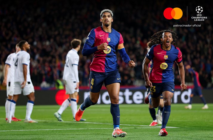 Football players photographed during UEFA Champions League match.