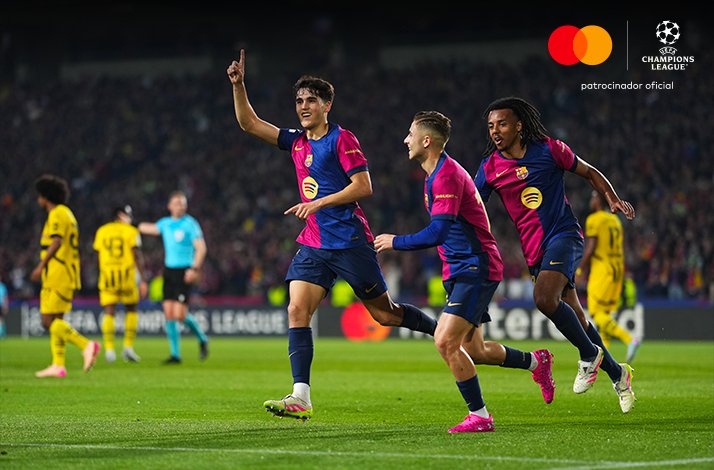 Football players photographed during UEFA Champions League match.
